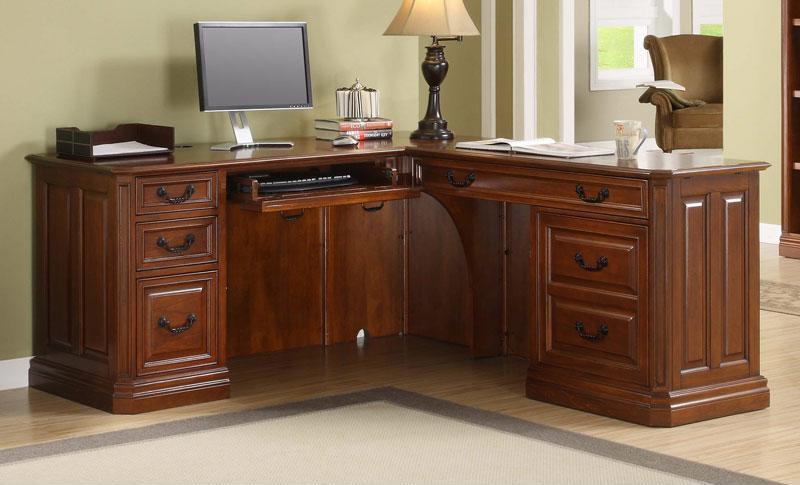 This L-shaped desk would fit perfectly in a corner of your home office.